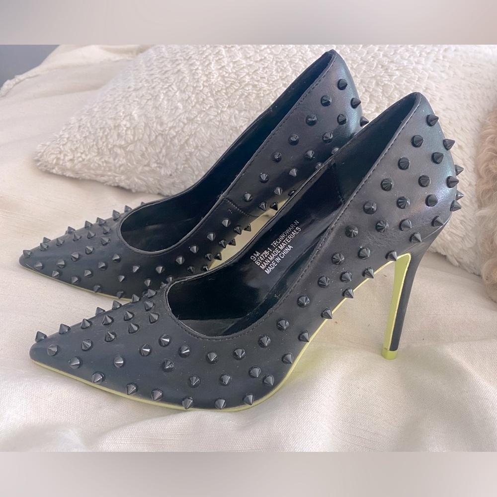 Fashion Nova black spike heel with neon yellow bottoms